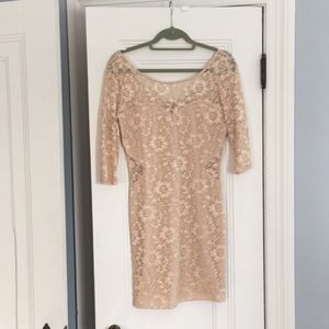 Beautiful nude/ blush mini dress with cut outs